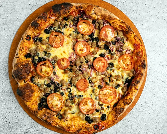 Taste of Italy Pizza with Italian sausage, black olives, red onions and tomatoes
